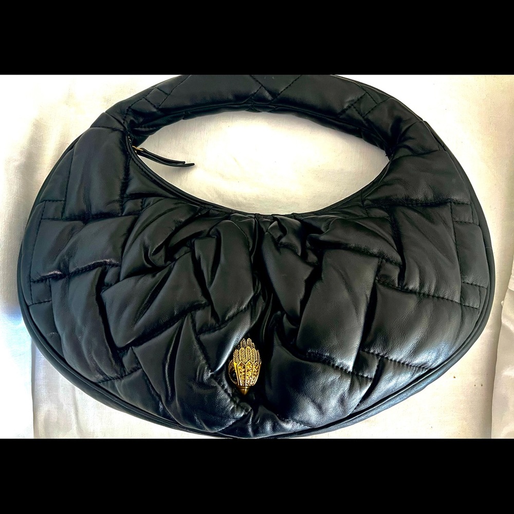 Kurt Geiger of London Leather bag with gold zip closure. Brand new/dust jacket